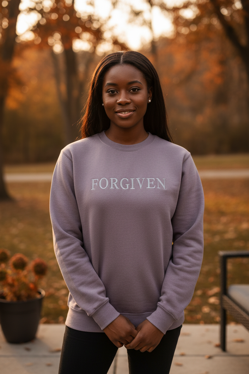 Second model wearing FORGIVEN dusty mauve crewneck sweatshirt, standard hip length, relaxed fit