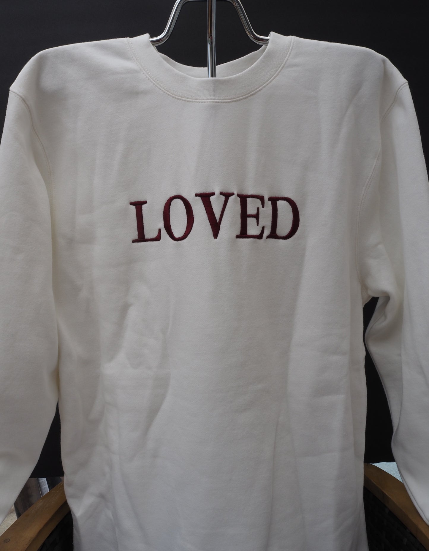 LOVED embroidered crewneck sweatshirt in cream with burgundy lettering on front